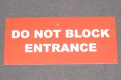 Sign-Do Not Block Entrance, red/white plastic, 18"w x 8"t, stock number S-2072