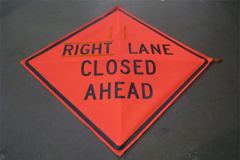 Sign-Right Lane Closed Ahead, fabric material, w/ "X" frame and, stock number S-2218
