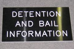 Sign-Detention And Bail Information, engraved plastic, black/white, stock number S-2246