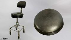 Stool, metal, 14"dia black vinyl padded seat with black vinyl back, stock number S-2268