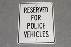 Sign-Reserved for police vehicles, white/black, foamcore, 12"w x 16"t, stock number S-2364