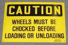 Sign-Caution Wheels Must Be Chocked, plstc, ylw/blk, 10"x14", stock number S-2447