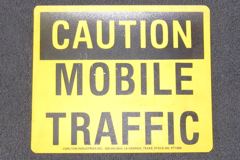 Sign-Caution mobile traffic, plastic, yellow/black, 12"w x 10"t, stock number S-2487