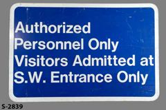 Sign-Authorized Personnel Only Visitors Admitted at S.W. Entrance, stock number S-2839