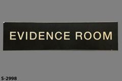 Sign-Evidence Room, blk/wht, plastic, 12"w x 3"t, stock number S-2998