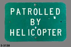 Sign-Patrolled By Helicopter, green/white metal, 18"w x 12"t, stock number S-3138