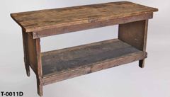 Table/workbench, dark wood w/ red stains & bottom shelf, stock number T-0011d