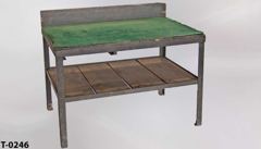 Table, green masonite top, wood plank bottom shelf, 6" backsplash, stock number T-0246
