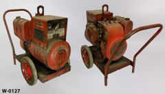 Arc welder, on cart, orange metal, 2 large red wheels & handle, stock number W-0127